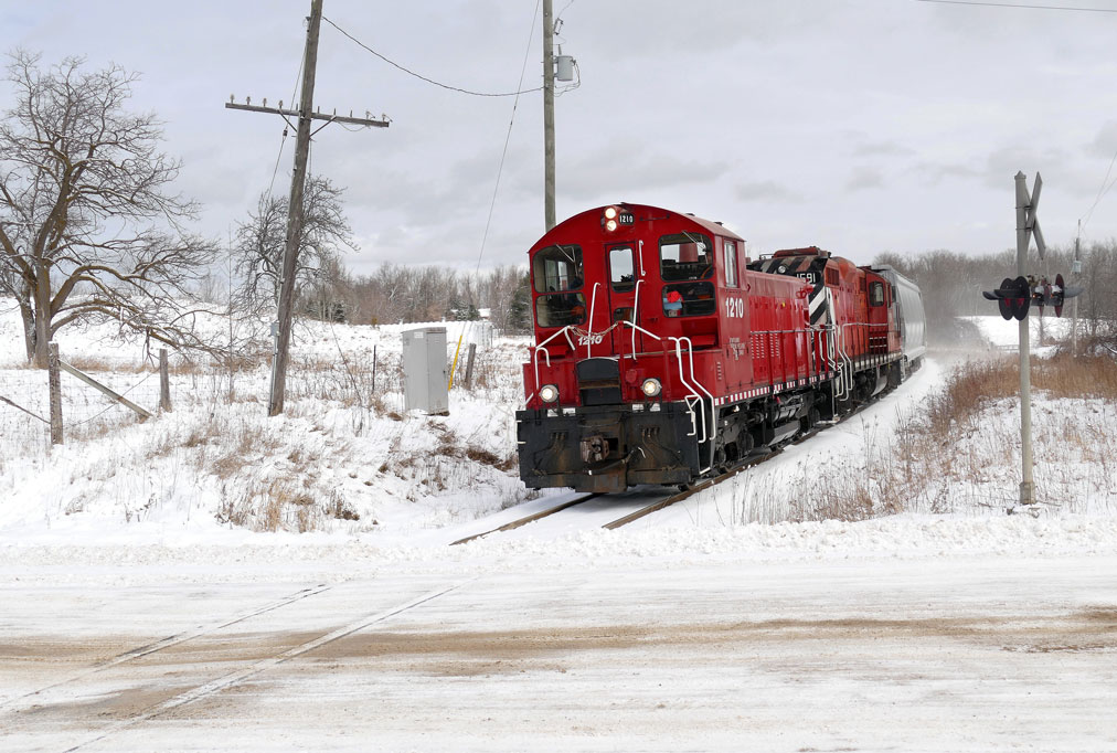 Northbound OSR crosses Concession 11 at 'Danger Bell' in Puslinch Township.
