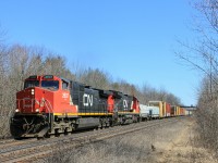 I spy foamers on the bridge! Oh, anyway. CN 331 departs Hamilton with a Dash 9, and a standard cab C40-8. Wrong leader though...