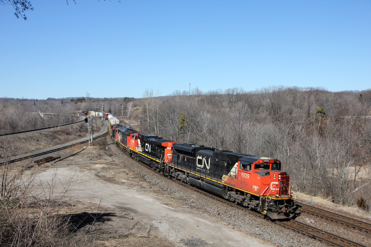 For the second straight day, we have a massive 384. The previous day having over 800 axels, and todays having a few less. A nice lashup is featured as 384 rounds the bend in the last legs of the Dundas Sub.