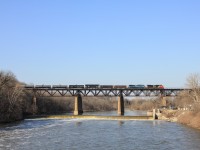 The rush of late afternoon trains ends with 330 crossing the Grand River with the power 382 brought into Sarnia earlier today. 435 371 394 330 and VIA 76 all came within 45-50 minutes