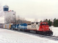 Rumbling over that trackage now long gone, SOO 6610, GATX 7365, and CRL 603 are seen heading toward Clifton Hill and the US border in downtown Niagara Falls before the line was removed for construction of the Fallsview casino. Skylon tower in the background is clue to location of photo. As much as the fans flock for a white SOO these days, never were they overly common. A nice alternative to the endless red. :o) *The CRL stands for  Conrail Leasing.