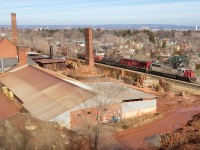 From high atop the hill, SOO 6027 is seen passing the historic Hamilton Brick Works with Canadian Pacific train no. 246 as they set off their steel in Kinnear Yard. In all of my years photographing trains in Hamilton, this angle has evaded me - in fact, I didn't even know it existed. Surprisingly, though, this angle is quite accessible. However all you need is a train - thankfully CP played ball.