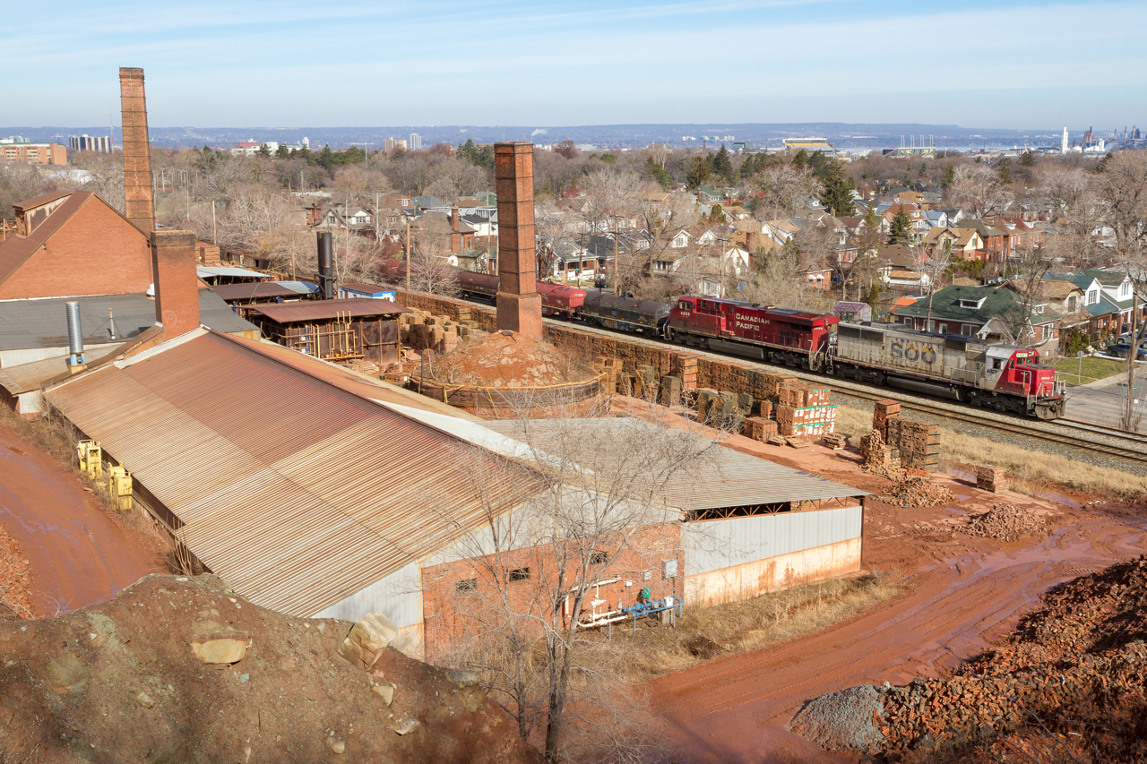 From high atop the hill, SOO 6027 is seen passing the historic Hamilton Brick Works with Canadian Pacific train no. 246 as they set off their steel in Kinnear Yard. In all of my years photographing trains in Hamilton, this angle has evaded me - in fact, I didn't even know it existed. Surprisingly, though, this angle is quite accessible. However all you need is a train - thankfully CP played ball.
