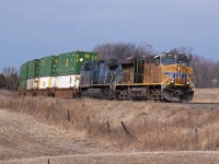 CP 142 sports a pair of non CP motors in the form of UP 5530 and CEFX 1059 as they roll by mile 144 of the Belleville Subdivision.