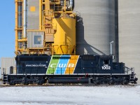 Canadian Wheat Board's SD40-2 #1002 sits quiet outside of the brand new elevator at the brand new super terminal just west of Bloom on CN's Rivers Sub.