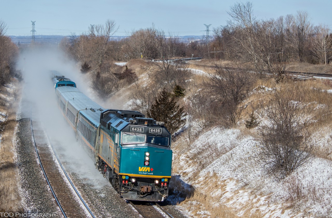 The late morning J-train out of Toronto kicks up clouds of fresh powder from an overnight snowfall.

Not many snow shots this year.. I guess this will have to do! :p