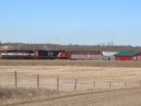 Heading into the siding for a meet, BCR 4604 glides past the local ranch.