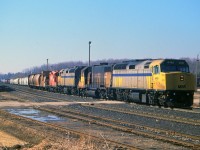 Back in the mid-90s when CP was leasing everything they could get their hands on, sometimes even us "seasoned" guys could not believe what we were seeing. This oddity made up the Guelph Jct Turn, which used to come from The Big Smoke,interchange at the Junction and return. VIA 6456, HATX 216, VIA 6455, CP 8241 brought in a long train, set off most it's train east of the junction and then backed around the wye, and as you see it in this image, it is nosed up to the "Guelph Jct" namesign, and is going to drop off the rest of its' train; then running back east with only the lead three units. Pity the HATX 216 (x-UP 2110) is so filthy, but ya take what ya can get.