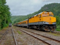 In late 2009 CN acquired three ex Denver Ski Train EMD F40PH's for use on the Agawa Canyon Tour Train and the passenger train that used to run on the line.  CN numbered these units 104, 105 and 106.  They arrived wearing the yellow paint of their previous owner with the old decals scraped off.  They would run around in this paint for a couple years before being sent to receive their current Algoma Central inspired maroon paint.  <br><br> Pictured is CN 106 on the point of the Canyon Tour Train ready to depart for Sault Ste Marie with CN 105 shoving on the rear.  CN 105 has recently been stretching its legs on CN O998 the TEST train, as shot by many RP.ca contributors this past weekend.  <br><br> With the tour train returning this year to run June to October, at least two of the F40's will be getting work...hard to tell what will happen in the future. 