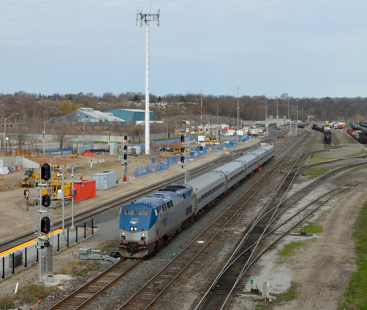 Amtrak (VIA) P097-24 coasts through CN/SOR Stuart Street yard in Hamilton en route to Niagara Falls and points beyond.  Hopefully all the construction of the new GO station will soon be finished.