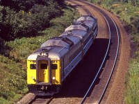 Heading into Halifax, this train is just through Windsor Junction and is about to duck under Highway 102 (The "Bi - Hi", or Bicentennial Highway for those that remember such things). Once again, 3 cars suggest that it came from Sydney.