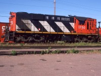 Not really exciting - a re-trucked RS-18 for light rail use. The interesting thing, and this is not too evident, is that it was shot in PEI. In the background are a couple of snow plows.