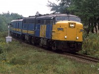This may be my last shot of an active FPA-4. My vacation in Nova Scotia was over and I would be moving from Calgary to Edmonton to attend the University of Alberta. My brother would continue to photograph the old girls, and document the transition over to the F-40PH's.
This is the westbound "Atlantic" heading through Windsor Junction on a gloomy overcast day.