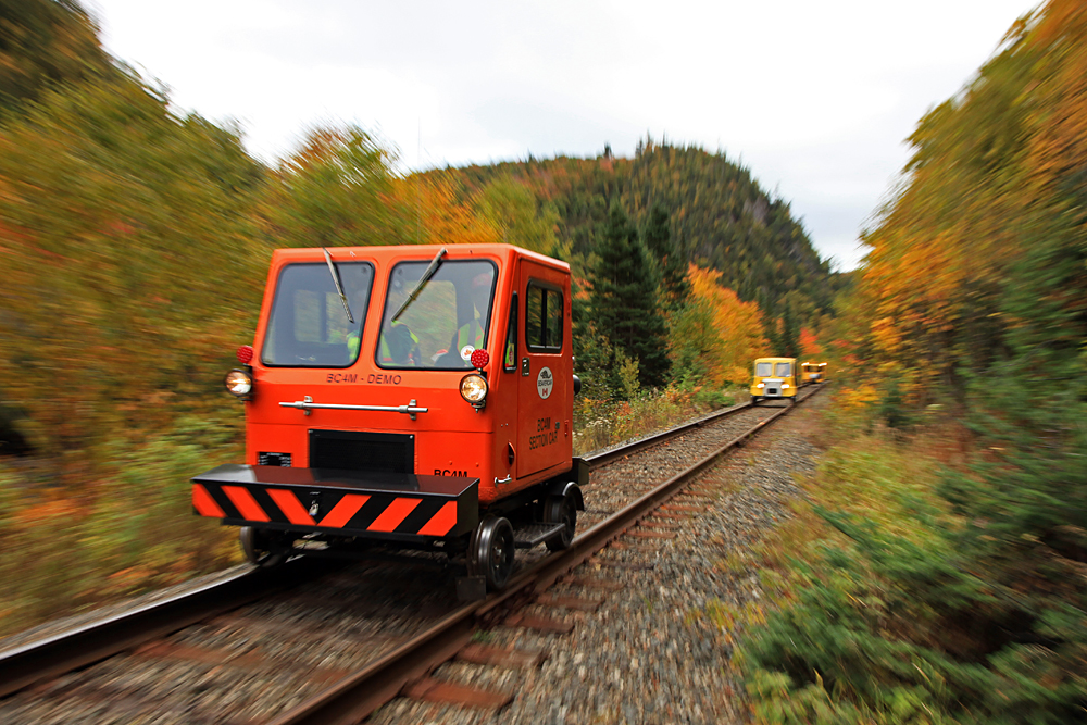 Every year we stayed in Agawa we'd run into the NARCOA folk running ahead of the tour train on their overnight journey up to Hearst and back. This year we had hiked down to the "112 Bridge" earlier to do some fishing and encountered them as we were making our way back. I always liked how the vivid colors of their speeders matched the Algoma foliage at this time of year!