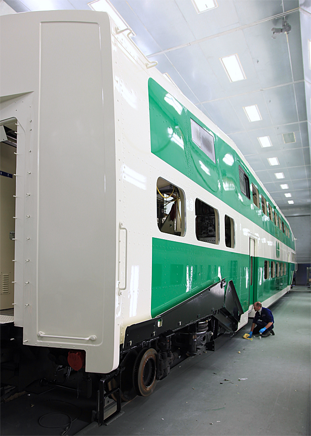 An ON Shops worker puts the finishing touches to a GO coach in for refurb back in 2011. I regret that I have forgotten his name in the 5+ years since this day but from watching him for the brief time we were in there it was obvious he took pride in his work!