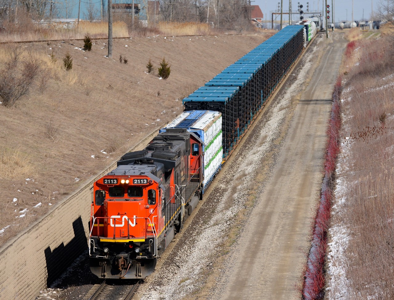 CN 2113 with IC 1012 lead train 501 west bound for Port Huron, MI., by way of the "Paul M. Tellier" St. Clair River Tunnel.