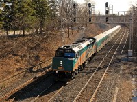 Chasing its shadow out of the late afternoon sun VIA 76 enters the plant at Snake heading for Aldershot and points beyond.