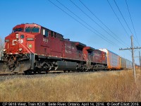 CP 9818 is in charge of a lengthy 235 on April 14, 2016.  Since the weather was good and the weeds haven't started to grow yet, I figured it would be good to make the best of my backyard..... Yes, this is in my backyard.  I just hop my fence and I'm trackside...  The spot isn't the most photogenic, but it certainly is convenient!!