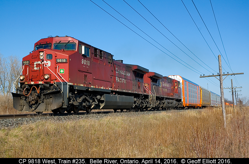 CP 9818 is in charge of a lengthy 235 on April 14, 2016.  Since the weather was good and the weeds haven't started to grow yet, I figured it would be good to make the best of my backyard..... Yes, this is in my backyard.  I just hop my fence and I'm trackside...  The spot isn't the most photogenic, but it certainly is convenient!!