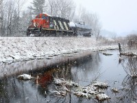 CN 595 heads south for Longford Mills during a typical late-April flurry.