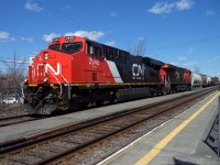  CN-2948 fresh leading loco with CN 2826 a EF 644 n pulling over 7,000 feets of freights cars going to Tashereau yard Montréal near Dorval 