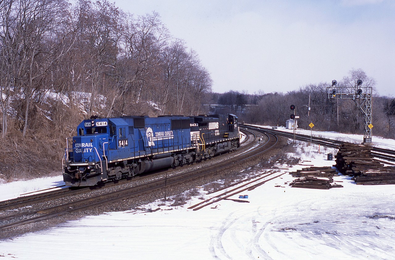 This is one of those situations that still has me scratching my head. On a sunny March 2003 morning I was hanging out at Hamilton West when I heard the RTC telling a 334 they were going to be backing up the Dundas sub to clear for a Via and CP to meet on the Oakville. This sounded crazy as 334 was usually a monster train. But as I looked over from Hamilton West it turned out to be just light power, NS light power. So I hoofed-er over to Bayview and grabbed this shot.