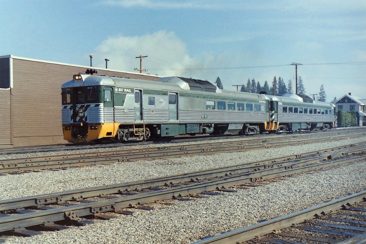 I was walking along the outside edge of the Quesnel BC yards, & caught the daily north bound passenger train as it started to leave town. The exterior of the cars were spotless, which showed to me that the BCR staff was proud of them. Always was a great place to take photographs of local BCR operations.