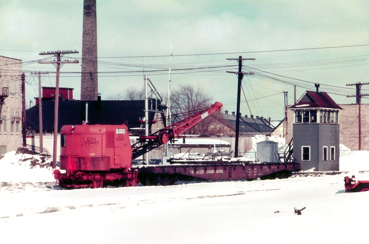 Under the watchful eye of 'the man in the tower', a CN Burro moves eastward approaching Rectory St in London in a scene that just isn't possible any more. I've wondered how many of these old Watchman's Towers still stand in this country. Note that the crossing gates are not yet down.