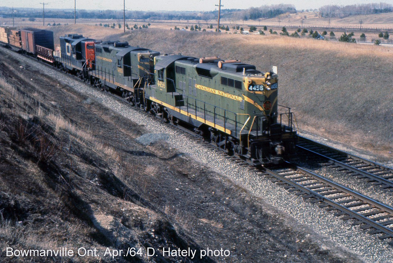 CN Extra East 4456 is approaching Bowmanville at Waverly Road with typical power for the time. Notice the freshly burned right of way. Railways were forced to end this practice in the late 1960s and the property soon became the jungle we know today.