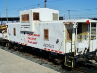 Originally a yellow CP Rail Caboose #434621 it was converted to a Maintenance of Way transporter for Engineering Services in February 2002.