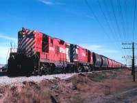 Just coming into Swift Current, heading west, is CP 8664 and 4242 with a long string of grain hoppers. The lead unit GP9 was eventually rebuilt to CP 1557 (GP9u) and then retired in 2012. The M-424 is currently on the Arkansas & Missouri, according to the CTG.