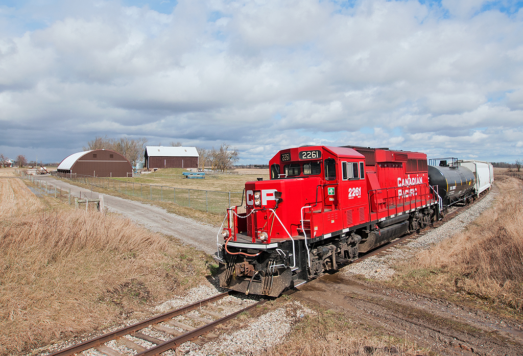 Back again for a second time  CP 2261 heads north along the former Canadian Pacific Owen Sound Sub at Mile 17 with a short freight in tow. With CCGX 4009, OBRY's lone GP9 down with a prime mover failure, the CPR lent the Cando operation a GP20C-ECO for the time being while another former CN GP9 from Winnipeg takes over.