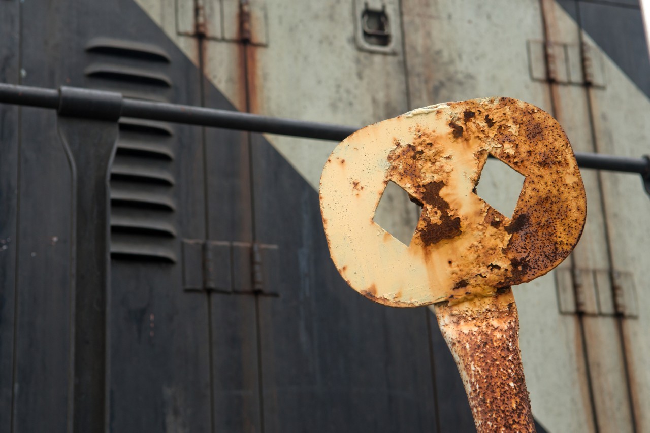 A vintage restricted clearance sign is seen still earning it keep in Prince George BC. Making these signs was a project often given to the new guy at the shop, the post's were usually made from old boiler tubes with the end's pinched. The imperfections in the diamond shaped cuts also show the human touch quite well.