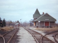 Here is another one of those 'out in the boonies' stations I hunted down many years ago. Unfortunately, I was so busy running around I kept poor notes. The CN line thru here, Guelph to Fergus over to Palmerston to Kincardine, began life in 1870 as the Wellington, Grey & Bruce. CP also ran thru Fergus, a branch line over from Cataract on the Credit Valley Rwy in 1879 reached Elora. (CP took over the CVR in 1883). All that is needed is someone with the knowledge of Fergus (are you out there, D.A.Y.??)to explain this scene. Today all track has been removed, as well as the "Grimsby-lookalike" station. CP had a station nearby as well, but it was demolished in the early 1970s. An interesting view this is, of old Ontario branchline railroad.