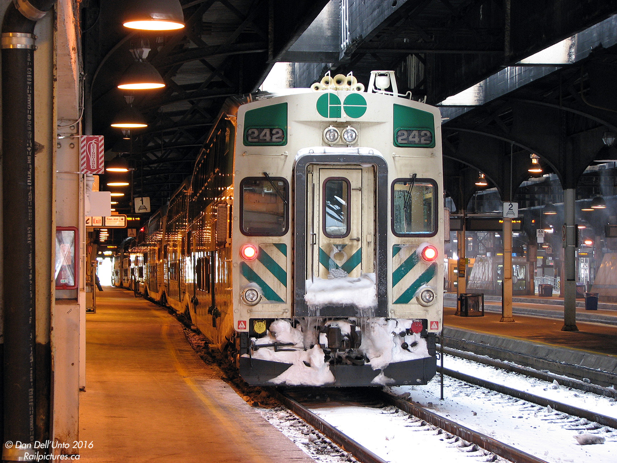 A cold day of shuttling commuters between Brampton and Toronto finds the regular GO Transit 8-car (L8) consist of "The Bramalea Flip",as it was known by some employees at the time, taking shelter under the train shed on Track 1 at Union Station. Snow can be seen blowing in a few tracks over off the roof of the 1920's Bush-style trainshed, with more encrusted on the front of Bombardier-built cab car 242 (still one of the newest in the fleet at the time), built up after its morning and afternoon trips alternating the lead position with F59PH 534 on the other end.

It's 2:51pm, which means there's still enough time to grab some Harvey's in the Great Hall before returning for #281's usual "15:15" departure as shown in the Georgetown line timetable. Hastily-scrawled writing in the day's notepad entry have an arrow pointed to 242 with the words "railfan seat", indicating we got our preferred seating looking out the front of the train for the 36-minute ride to Bramalea.

(The other notable event of the day was the first run of an MP40PH-3C in regular revenue service: 602 with 560 and a 10-car train on the Lakeshore line (also rode behind on run #919)).