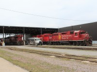 Here we have GP38AC #3003 and GP38-2 #3117 getting spotted to be fueled by the tanker truck. Locomotives are sometimes supplied this way in the yard when the service island is filled to capacity getting the days trains made up.