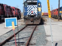 From Canadian Pacific's Iowa Chicago & Eastern subsidiary this Sd40-3 (modified with upgraded electronics over an SD40-2) awaits it's fate on the storage line. It was previously ICE #208 and is still in Railink colors and was I&M Railink 208.