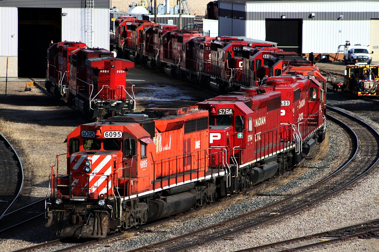 Former CP SD40 now DME 6095 sits parked in Moose Jaw along with other SD40's of Soo and CP heritage including one of the few GP9u's.