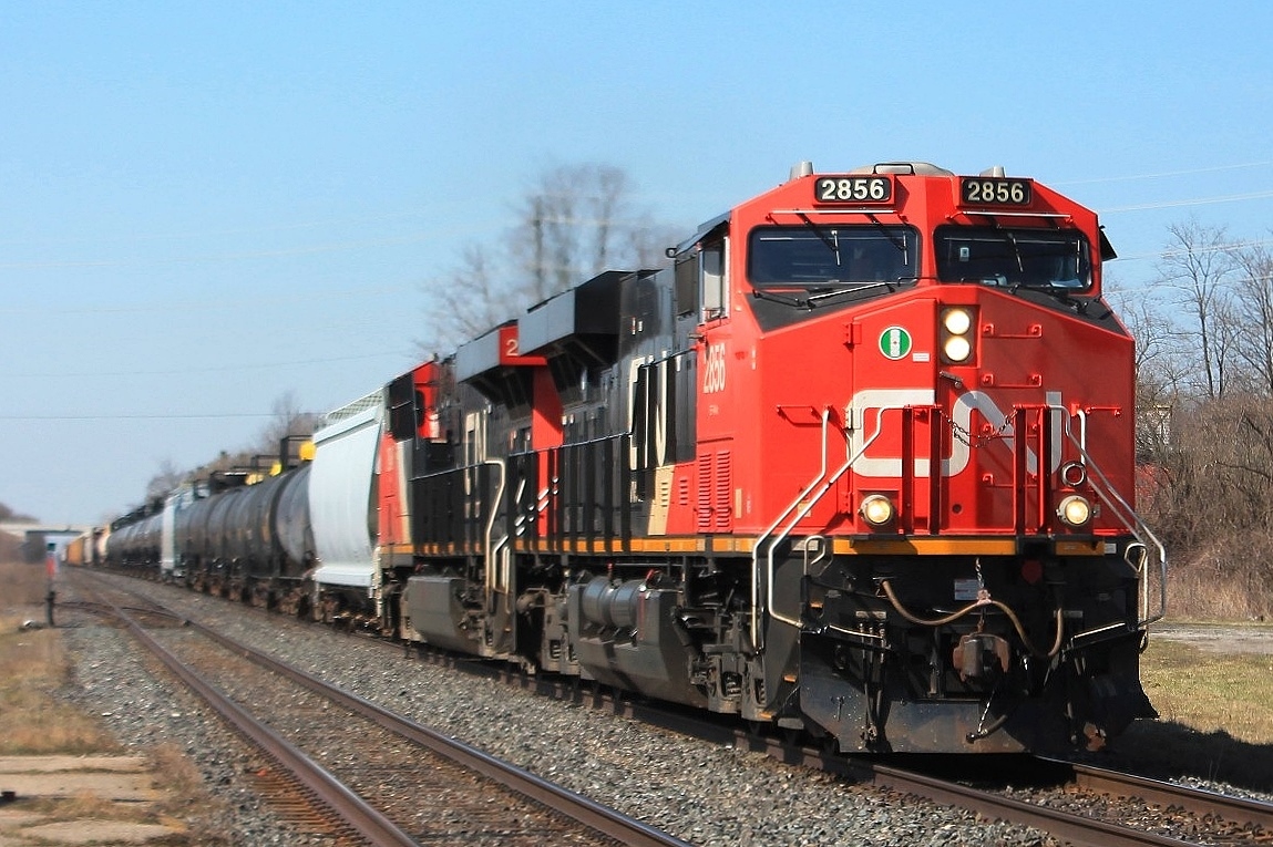 Eastbound mixed freight powers through Ingersoll led by  2856 and sister 2846.