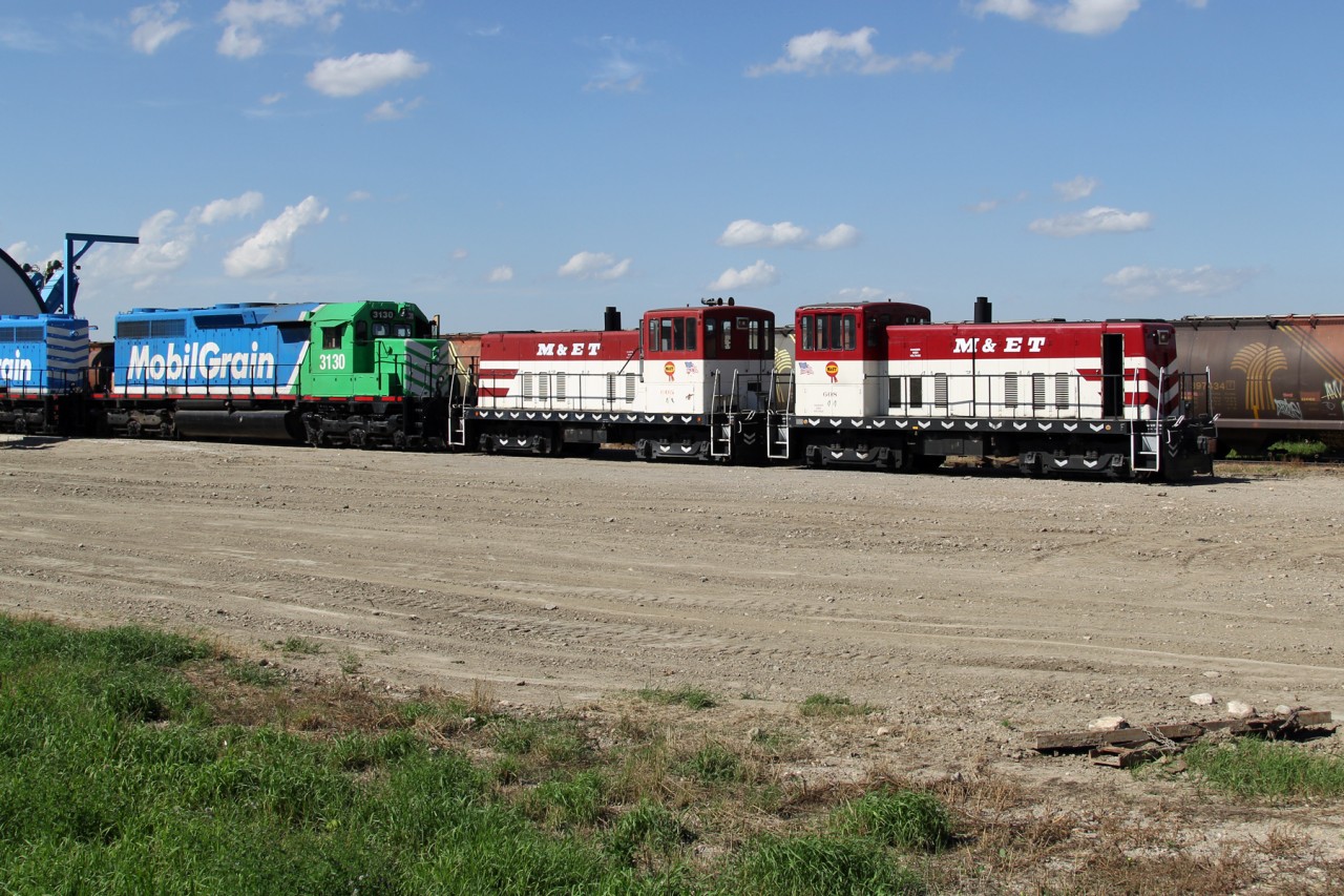Former Modesto and Empire Traction 608 and 605 along with ex-KCS SD40-3 3130 parked at the Mobil Grain terminal in Aylesbury.