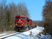 On a bright sunny but cold day, CP 246 with its 356 axels and 5164 feet of train, is led by CP 8774 down the Hamilton sub as they prepare to cross the Milburough Line and MM 72.52 cleared to Desjardins.