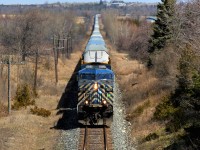 A lone CEFX 1057 works extremely hard to haul this 6000ft plus load of auto racks up the grade as it prepares to go under the Highway 6 overpass and MM45 on the Galt sub. This is a good vantage point for shooting trains but not the best of spots at this time of day for traffic biting at your coat tail.