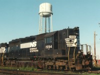Got lucky with this shot as the 1594 had another unit coupled to it's head end. As I was leaving a crew came by and took the other unit leaving me with a clear nose shot. The water tower still has legible Canadian Pacific script at this time.