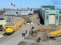 Shift change at National Steel car - new well cars are being switched into the finishing bays as final touches have yet to be applied. NSC is truly one of our made in Canada success stories, despite the incursion of southern US and Mexico labour pools, this facility pumps cars out on multiple shifts per day. As alluded in some earlier rp.ca photographers flag shots, it took a dozen shots to get one with the flag completely unfurled. This is also another operation that suprises me to still exist in 2016 - considering the strike in 2009, and the construction of the new National Alabama a year or so later.. which failed.. NSC is here to stay for now.