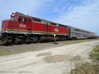 A bit of wide angle accentuation shows off the CN noodle on the cab of 105, usually captive on the Algoma Central Railway out of the Sault. Thanks to the Sun for making an appearance. :)