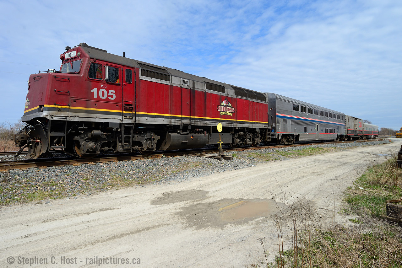 A bit of wide angle accentuation shows off the CN noodle on the cab of 105, usually captive on the Algoma Central Railway out of the Sault. Thanks to the Sun for making an appearance. :)