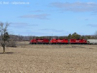 Three geeps groan as they attain track speed on the Galt sub, having left the junction with 13 cars, 1300 feet and about 1200 tons (mostly empties) of train. One of these three second generation motors would be down for the count leaving the crew to doubt their ability to lift about 8000' of train at both Wolverton, W.Coak. and Coakley. They sure sounded good though!


