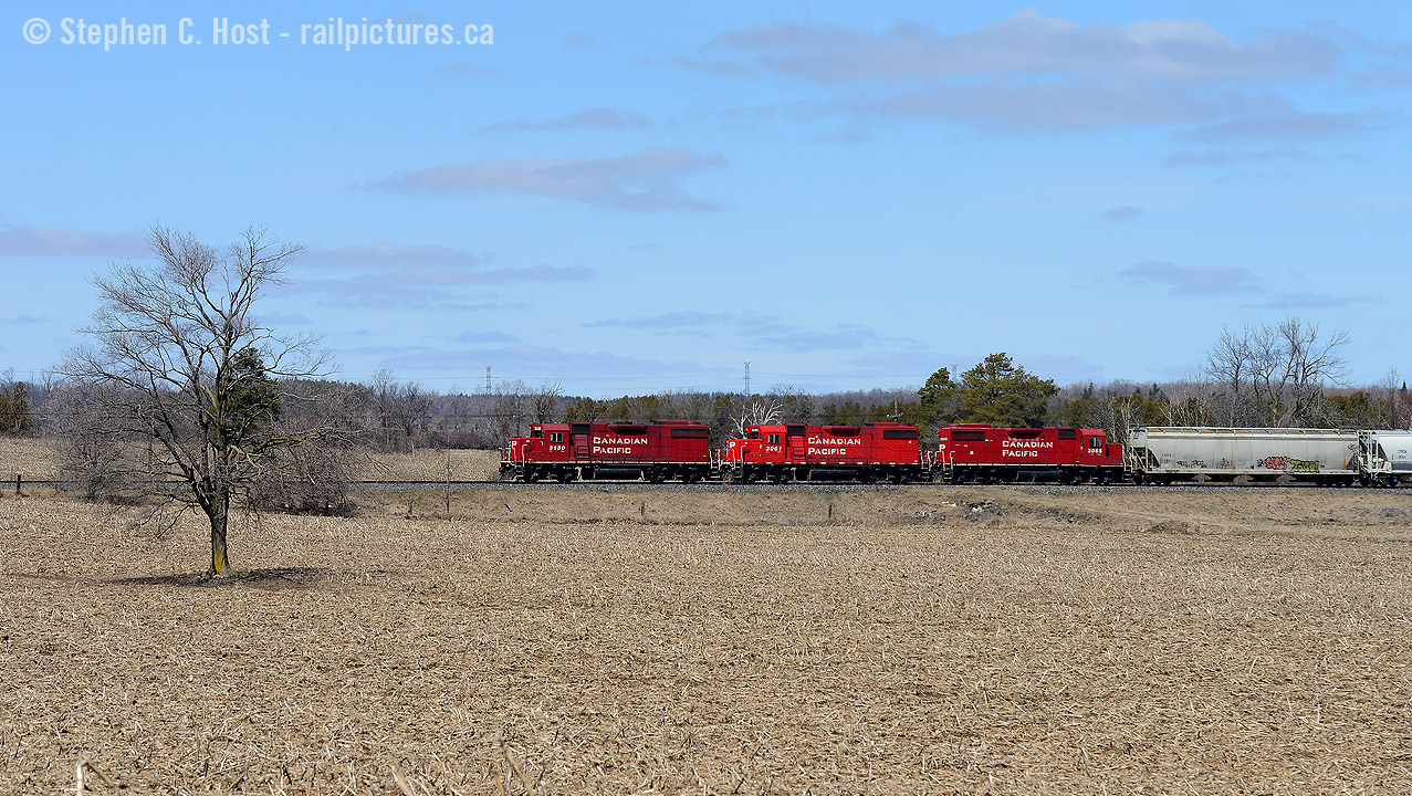Three geeps groan as they attain track speed on the Galt sub, having left the junction with 13 cars, 1300 feet and about 1200 tons (mostly empties) of train. One of these three second generation motors would be down for the count leaving the crew to doubt their ability to lift about 8000' of train at both Wolverton, W.Coak. and Coakley. They sure sounded good though!