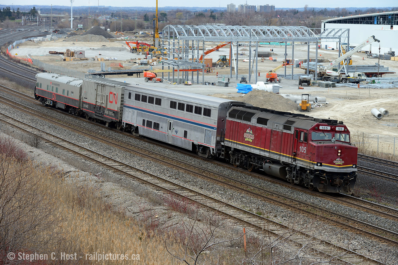Hopkins St is still a place to go for the next couple months, Blair Rd is still not paved, but I don't think it'll be too long. As Eric Portelli stated in one of his shots from here - if this is the last train I shoot from this bridge, I'm good.In this photo o998 is passing the new GO East maintenance facility with this rather interesting and unusual consist. 
This train should be heading back west soon as o999, but sadly CN 105 has suffered water issues and 2173 was added to the point for Halifax. Since then,CN 2173 was switched out for 4806 for the run over the NBEC. Here's hoping they figure the issue out and let 105 lead again once it gets to Montreal and Ontario for the rp.ca regulars! Good luck boyos!