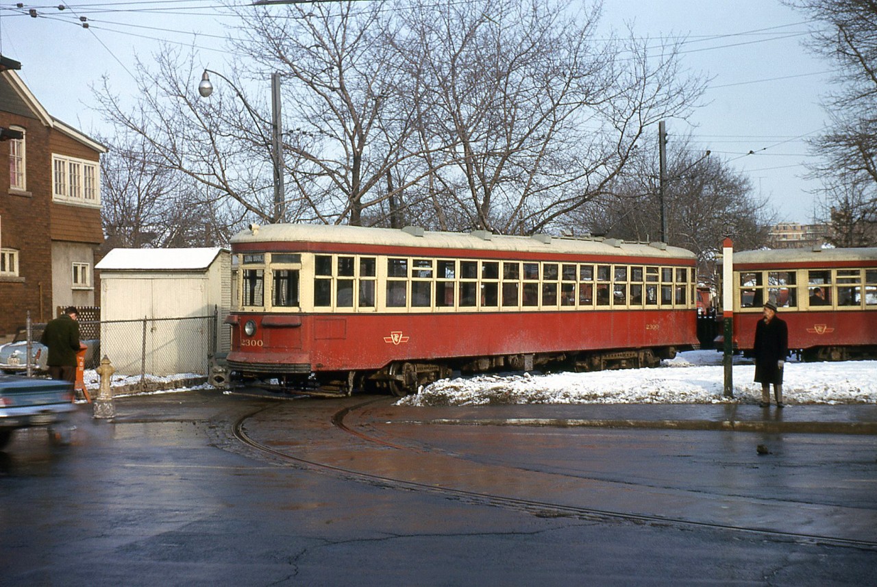TTC 2300 is just one of the three Peter Witt cars on the Upper Canada Railway Society charter on this day (2300, 2834 and 2894), posing with one of the other two cars in the sun at Eglinton Loop, on Mount Pleasant Road just north of Eglinton (at the north end of the St. Clair streetcar route, and later the brief Mount Pleasant streetcar).